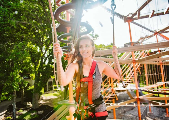 Girl smiling on ropes course